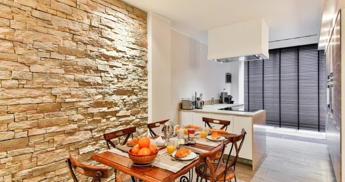 Un enduit identique à l'apparence de la pierre de parement