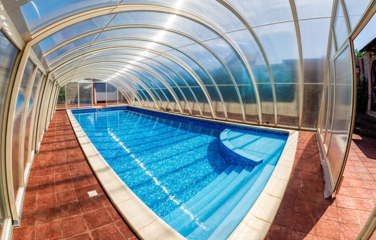 couverture piscine haut de gamme véranda