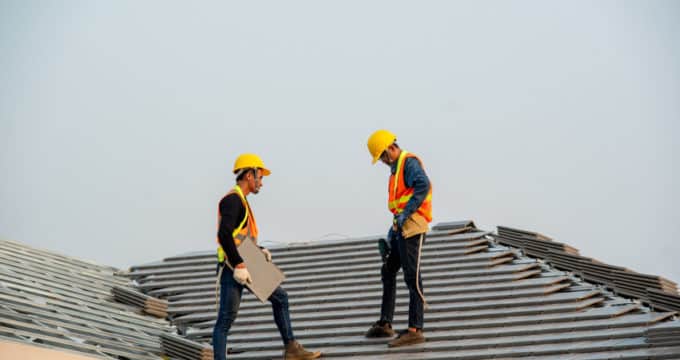 construction worker wearing safety harness belt during working o